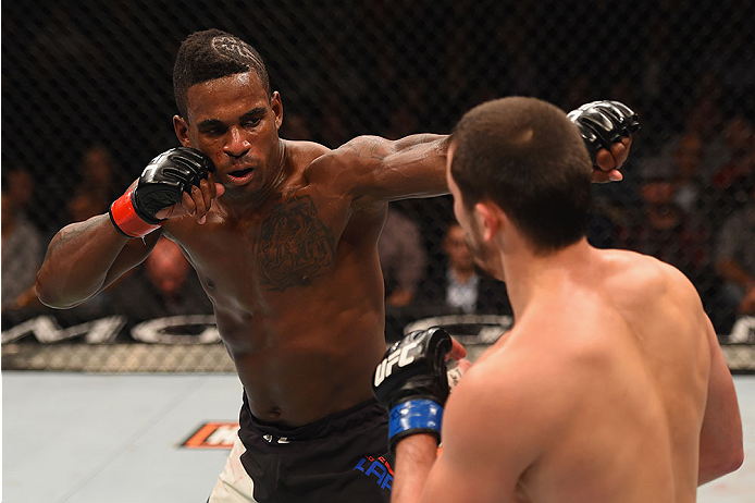 LAS VEGAS, NV - JANUARY 02: (L-R) Lorenz Larkin punches Albert Tumenov of Russia in their welterweight bout during the UFC 195 event inside MGM Grand Garden Arena on January 2, 2016 in Las Vegas, Nevada. (Photo by Josh Hedges/Zuffa LLC/Zuffa LLC via Gett