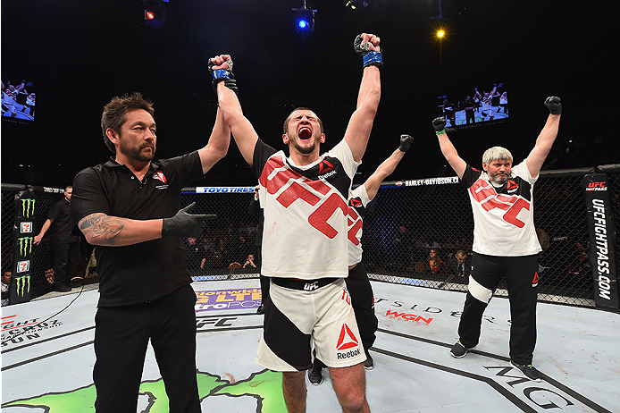 LAS VEGAS, NV - JANUARY 02: Albert Tumenov of Russia reacts to his victory over Lorenz Larkin in their welterweight bout during the UFC 195 event inside MGM Grand Garden Arena on January 2, 2016 in Las Vegas, Nevada. (Photo by Josh Hedges/Zuffa LLC/Zuff