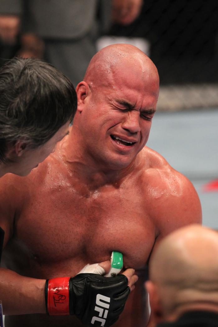 TORONTO, ON - DECEMBER 10: Tito Ortiz exhibits the pain of a blow to the ribs after his TKO loss to Antonio Rogerio Nogueira during the UFC 140 event at Air Canada Centre on December 10, 2011 in Toronto, Ontario, Canada. (Photo by Nick Laham/Zuffa LLC/Z
