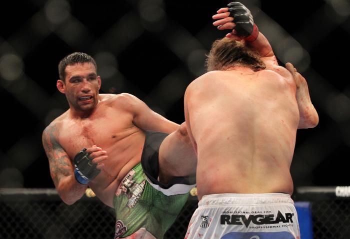 LAS VEGAS, NV - FEBRUARY 04: Fabricio Werdum (left) kicks Roy Nelson during the UFC 143 event at Mandalay Bay Events Center on February 4, 2012 in Las Vegas, Nevada. (Photo by Josh Hedges/Zuffa LLC/Zuffa LLC via Getty Images) *** Local Caption *** Fabri