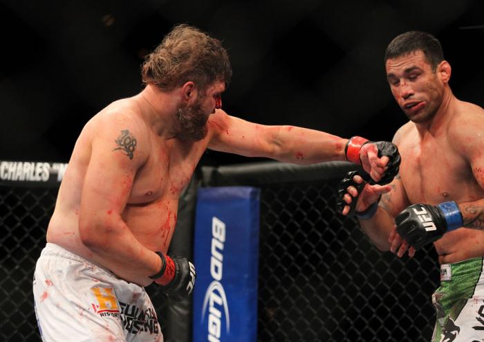 LAS VEGAS, NV - FEBRUARY 04: Roy Nelson (left) punches Fabricio Werdum during the UFC 143 event at Mandalay Bay Events Center on February 4, 2012 in Las Vegas, Nevada. (Photo by Josh Hedges/Zuffa LLC/Zuffa LLC via Getty Images) *** Local Caption *** Roy