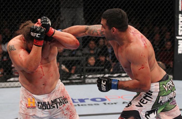 LAS VEGAS, NV - FEBRUARY 04: (R-L) Fabricio Werdum punches Roy Nelson during the UFC 143 event at Mandalay Bay Events Center on February 4, 2012 in Las Vegas, Nevada. (Photo by Nick Laham/Zuffa LLC/Zuffa LLC via Getty Images) *** Local Caption *** Fabri