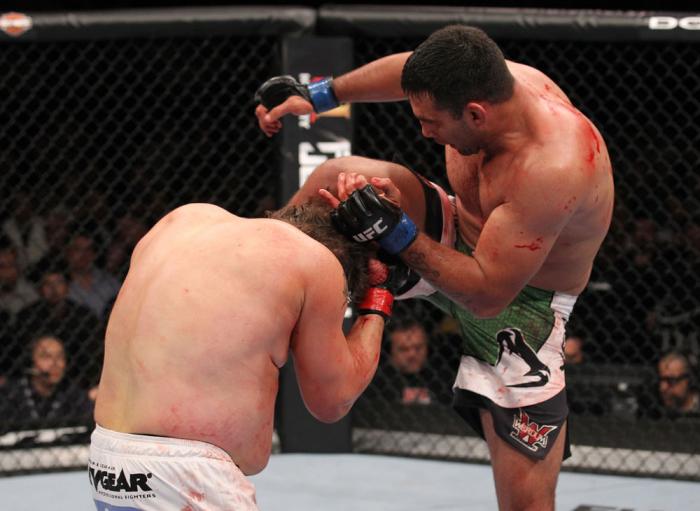 LAS VEGAS, NV - FEBRUARY 04: Fabricio Werdum (right) knees Roy Nelson during the UFC 143 event at Mandalay Bay Events Center on February 4, 2012 in Las Vegas, Nevada. (Photo by Nick Laham/Zuffa LLC/Zuffa LLC via Getty Images) *** Local Caption *** Fabri