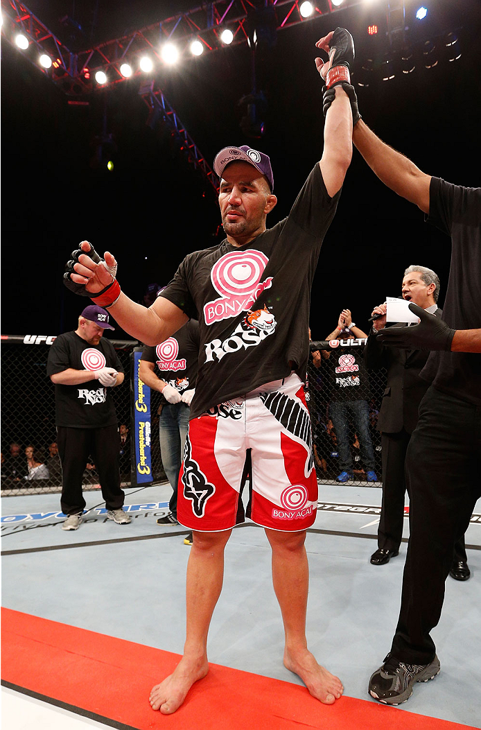 BELO HORIZONTE, BRAZIL - SEPTEMBER 04: Glover Teixeira reacts after knocking out Ryan Bader in their light heavyweight fight during the UFC on FOX Sports 1 event at Mineirinho Arena on September 4, 2013 in Belo Horizonte, Brazil. (Photo by Josh Hedges/Zu
