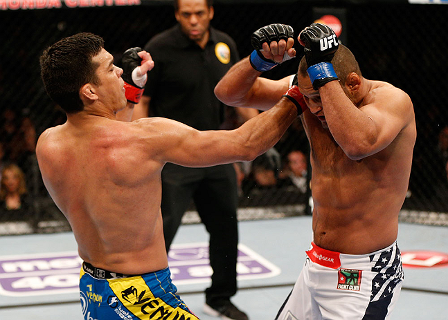 ANAHEIM, CA - FEBRUARY 23: (L-R) Lyoto Machida punches Dan Henderson in their light heavyweight bout during UFC 157 at Honda Center on February 23, 2013 in Anaheim, California. (Photo by Josh Hedges/Zuffa LLC/Zuffa LLC via Getty Images) *** Local Captio