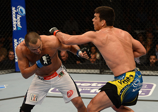 ANAHEIM, CA - FEBRUARY 23: (R-L) Lyoto Machida punches Dan Henderson in their light heavyweight bout during UFC 157 at Honda Center on February 23, 2013 in Anaheim, California. (Photo by Donald Miralle/Zuffa LLC/Zuffa LLC via Getty Images) *** Local Cap