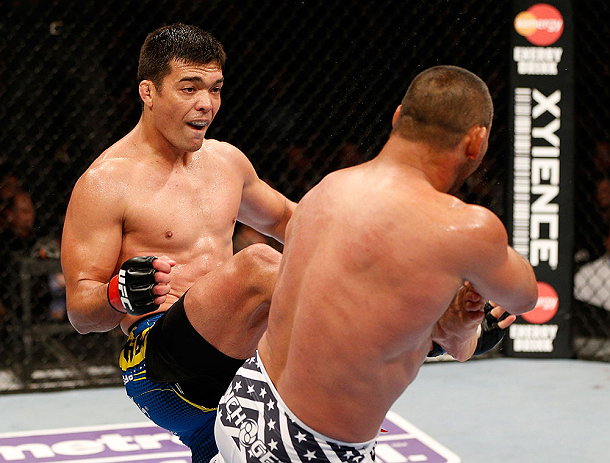 ANAHEIM, CA - FEBRUARY 23: (L-R) Lyoto Machida kicks Dan Henderson in their light heavyweight bout during UFC 157 at Honda Center on February 23, 2013 in Anaheim, California. (Photo by Josh Hedges/Zuffa LLC/Zuffa LLC via Getty Images) *** Local Caption