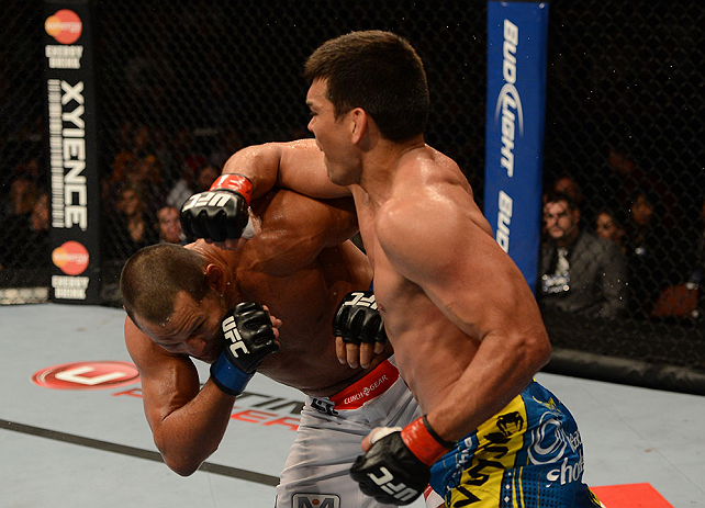 ANAHEIM, CA - FEBRUARY 23: (R-L) Lyoto Machida punches Dan Henderson in their light heavyweight bout during UFC 157 at Honda Center on February 23, 2013 in Anaheim, California. (Photo by Donald Miralle/Zuffa LLC/Zuffa LLC via Getty Images) *** Local Cap