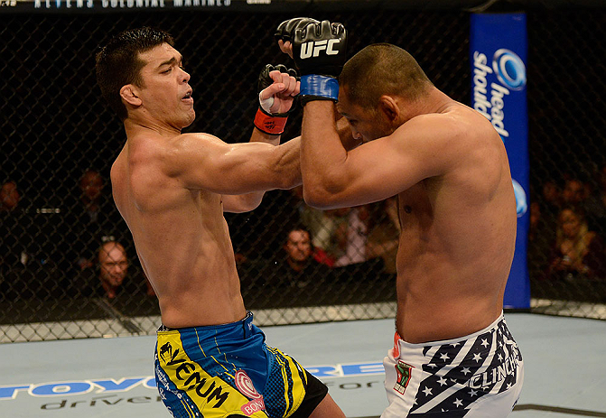 ANAHEIM, CA - FEBRUARY 23: (L-R) Lyoto Machida punches Dan Henderson in their light heavyweight bout during UFC 157 at Honda Center on February 23, 2013 in Anaheim, California. (Photo by Donald Miralle/Zuffa LLC/Zuffa LLC via Getty Images) *** Local Cap