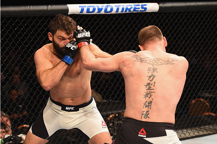 LAS VEGAS, NV - JANUARY 02: (L-R) Andrei Arlovski punches Stipe Miocic in their heavyweight bout during the UFC 195 event inside MGM Grand Garden Arena on January 2, 2016 in Las Vegas, Nevada. (Photo by Josh Hedges/Zuffa LLC/Zuffa LLC via Getty Images)