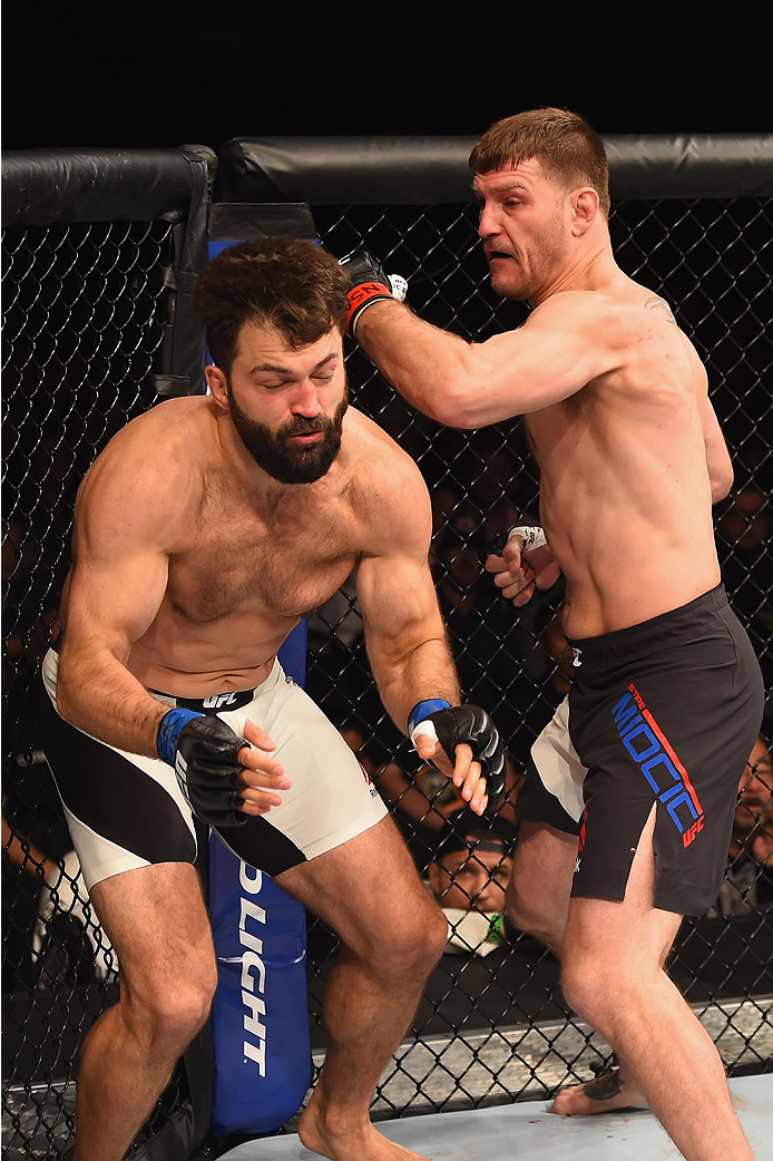 LAS VEGAS, NV - JANUARY 02: (R-L) Stipe Miocic punches Andrei Arlovski in their heavyweight bout during the UFC 195 event inside MGM Grand Garden Arena on January 2, 2016 in Las Vegas, Nevada. (Photo by Josh Hedges/Zuffa LLC/Zuffa LLC via Getty Images)