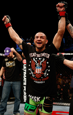LONDON, ENGLAND - FEBRUARY 16: Cub Swanson reacts after defeating Dustin Poirier in their featherweight fight during the UFC on Fuel TV event on February 16, 2013 at Wembley Arena in London, England. (Photo by Josh Hedges/Zuffa LLC/Zuffa LLC via Getty I