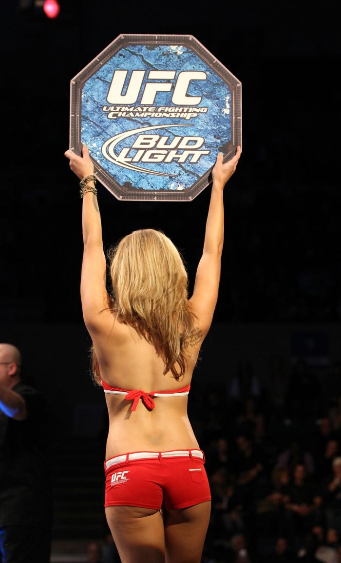 OMAHA, NE - FEBRUARY 15: UFC Octagon Girl Brittney Palmer introduces round one before the Dillashaw v Watson bout during the UFC on FUEL TV event at Omaha Civic Auditorium on February 15, 2012 in Omaha, Nebraska. (Photo by Josh Hedges/Zuffa LLC/Zuffa LL