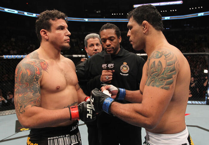 TORONTO, ON - DECEMBER 10: (L-R) Heavyweight opponents Frank Mir and Antonio Rodrigo Nogueira receive final instructions from referee Herb Dean before their bout during the UFC 140 event at Air Canada Centre on December 10, 2011 in Toronto, Ontario, Cana