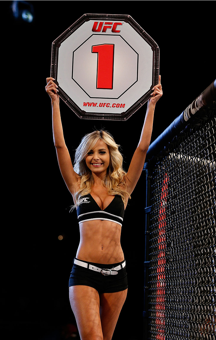 BELO HORIZONTE, BRAZIL - SEPTEMBER 04: UFC Octagon Girl Jhenny Andrade introduces a round during the UFC on FOX Sports 1 event at Mineirinho Arena on September 4, 2013 in Belo Horizonte, Brazil. (Photo by Josh Hedges/Zuffa LLC/Zuffa LLC via Getty Images)