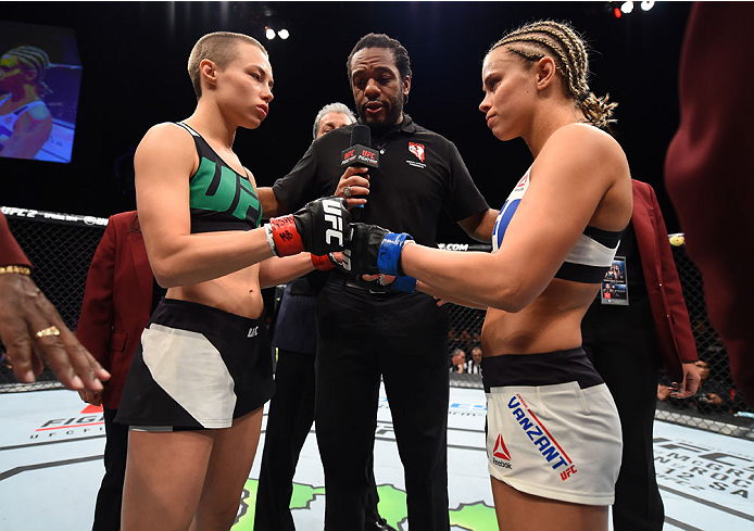 LAS VEGAS, NEVADA - DECEMBER 10: (L-R) Rose Namajunas touches gloves with Paige VanZant in their women's strawweight bout during the UFC Fight Night event at The Chelsea at the Cosmopolitan of Las Vegas on December 10, 2015 in Las Vegas, Nevada. (Photo