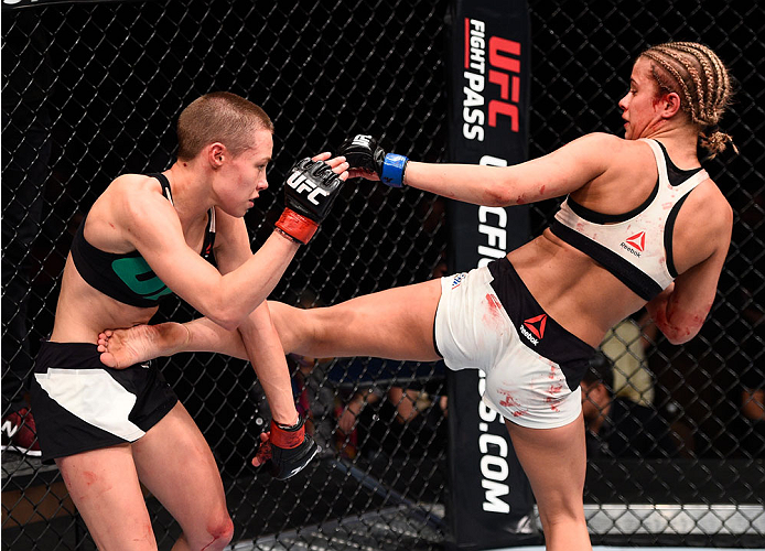 LAS VEGAS, NEVADA - DECEMBER 10: (R-L) Paige VanZant kicks Rose Namajunas in their women's strawweight bout during the UFC Fight Night event at The Chelsea at the Cosmopolitan of Las Vegas on December 10, 2015 in Las Vegas, Nevada. (Photo by Jeff Bottar