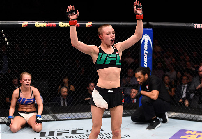 LAS VEGAS, NEVADA - DECEMBER 10: (R-L) Rose Namajunas celebrates her submission victory over Paige VanZant in their women's strawweight bout during the UFC Fight Night event at The Chelsea at the Cosmopolitan of Las Vegas on December 10, 2015 in Las Vega