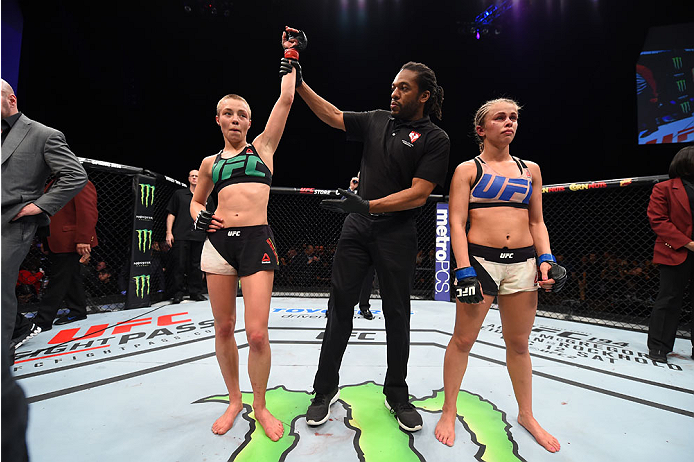 LAS VEGAS, NEVADA - DECEMBER 10: (L-R) Rose Namajunas celebrates her submission victory over Paige VanZant in their women's strawweight bout during the UFC Fight Night event at The Chelsea at the Cosmopolitan of Las Vegas on December 10, 2015 in Las Vega