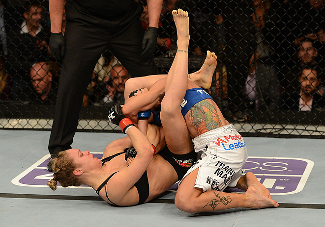 ANAHEIM, CA - FEBRUARY 23: Ronda Rousey (left) attempts to submit Liz Carmouche in their women's bantamweight title fight during UFC 157 at Honda Center on February 23, 2013 in Anaheim, California. (Photo by Donald Miralle/Zuffa LLC/Zuffa LLC via Getty