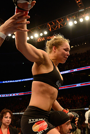 ANAHEIM, CA - FEBRUARY 23: Ronda Rousey celebrates her victory over Liz Carmouche in their women's bantamweight title fight during UFC 157 at Honda Center on February 23, 2013 in Anaheim, California. (Photo by Donald Miralle/Zuffa LLC/Zuffa LLC via Gett
