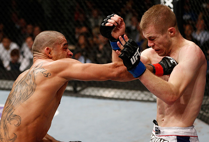 LONDON, ENGLAND - FEBRUARY 16: (L-R) Renan Barao punches Michael McDonald in their interim bantamweight title fight during the UFC on Fuel TV event on February 16, 2013 at Wembley Arena in London, England. (Photo by Josh Hedges/Zuffa LLC/Zuffa LLC via G