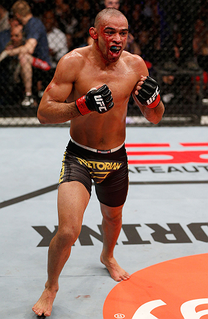 LONDON, ENGLAND - FEBRUARY 16: Renan Barao reacts after defeating Michael McDonald in their interim bantamweight title fight during the UFC on Fuel TV event on February 16, 2013 at Wembley Arena in London, England. (Photo by Josh Hedges/Zuffa LLC/Zuffa