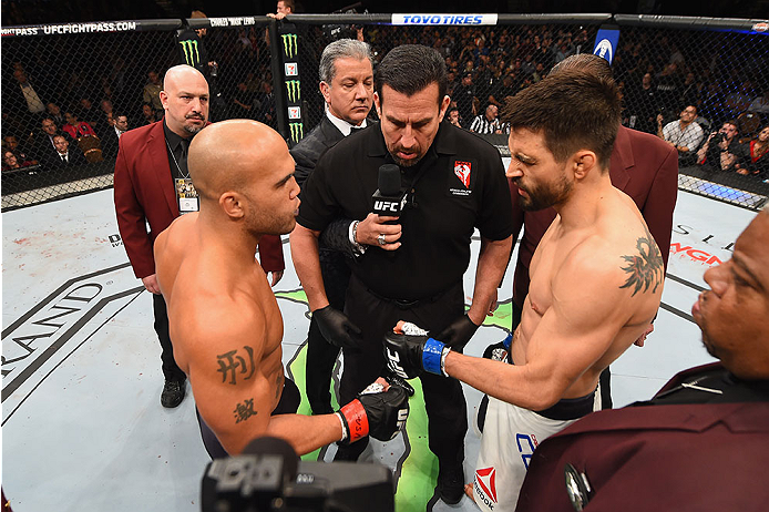 LAS VEGAS, NV - JANUARY 02: Robbie Lawler (left) and Carlos Condit (right) touch gloves in their UFC welterweight championship bout during the UFC 195 event inside MGM Grand Garden Arena on January 2, 2016 in Las Vegas, Nevada. (Photo by Josh Hedges/Zuff