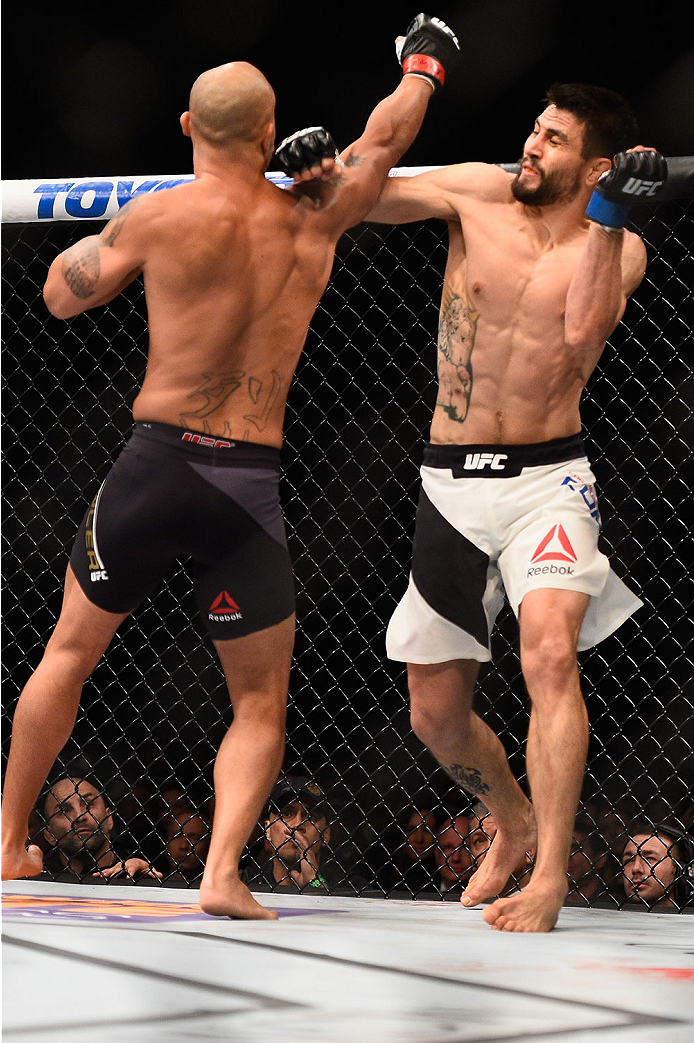 LAS VEGAS, NV - JANUARY 02: (L-R) Robbie Lawler punches Carlos Condit in their UFC welterweight championship bout during the UFC 195 event inside MGM Grand Garden Arena on January 2, 2016 in Las Vegas, Nevada. (Photo by Jeff Bottari/Zuffa LLC/Zuffa LLC v