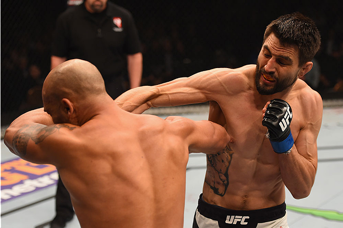 LAS VEGAS, NV - JANUARY 02: (R-L) Carlos Condit punches Robbie Lawler in their UFC welterweight championship bout during the UFC 195 event inside MGM Grand Garden Arena on January 2, 2016 in Las Vegas, Nevada. (Photo by Josh Hedges/Zuffa LLC/Zuffa LLC vi