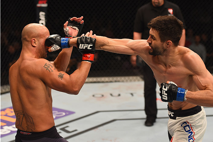 LAS VEGAS, NV - JANUARY 02: (R-L) Carlos Condit punches Robbie Lawler in their UFC welterweight championship bout during the UFC 195 event inside MGM Grand Garden Arena on January 2, 2016 in Las Vegas, Nevada. (Photo by Josh Hedges/Zuffa LLC/Zuffa LLC v