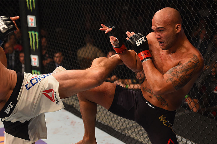 LAS VEGAS, NV - JANUARY 02: (R-L) Robbie Lawler blocks a kick from Carlos Condit in their UFC welterweight championship bout during the UFC 195 event inside MGM Grand Garden Arena on January 2, 2016 in Las Vegas, Nevada. (Photo by Josh Hedges/Zuffa LLC/Z