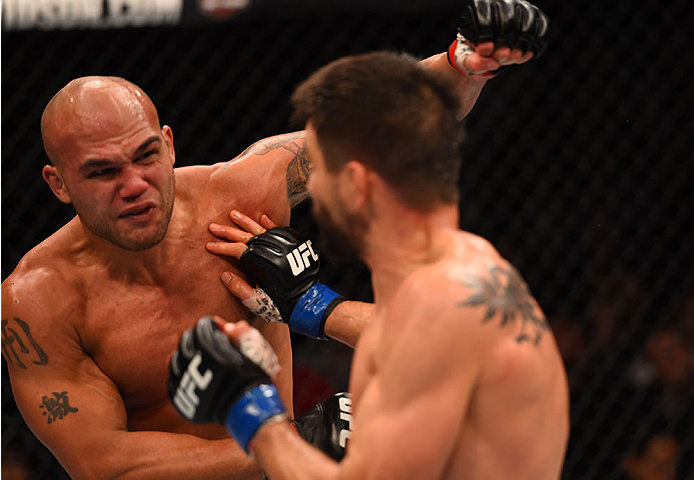 LAS VEGAS, NV - JANUARY 02: (L-R) Robbie Lawler punches Carlos Condit in their UFC welterweight championship bout during the UFC 195 event inside MGM Grand Garden Arena on January 2, 2016 in Las Vegas, Nevada. (Photo by Josh Hedges/Zuffa LLC/Zuffa LLC vi