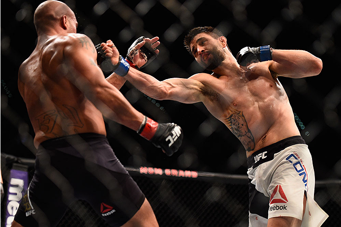 LAS VEGAS, NV - JANUARY 02: (R-L) Carlos Condit punches Robbie Lawler in their UFC welterweight championship bout during the UFC 195 event inside MGM Grand Garden Arena on January 2, 2016 in Las Vegas, Nevada. (Photo by Jeff Bottari/Zuffa LLC/Zuffa LLC v