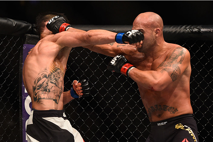 LAS VEGAS, NV - JANUARY 02: (L-R) Carlos Condit and Robbie Lawler exchange punches in their UFC welterweight championship bout during the UFC 195 event inside MGM Grand Garden Arena on January 2, 2016 in Las Vegas, Nevada. (Photo by Jeff Bottari/Zuffa LL