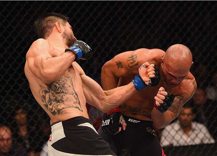 LAS VEGAS, NV - JANUARY 02: (L-R) Carlos Condit punches Robbie Lawler in their UFC welterweight championship bout during the UFC 195 event inside MGM Grand Garden Arena on January 2, 2016 in Las Vegas, Nevada. (Photo by Josh Hedges/Zuffa LLC/Zuffa LLC vi