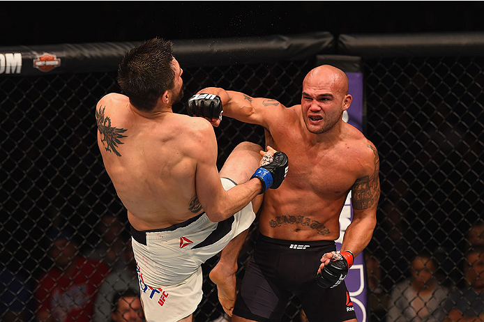 LAS VEGAS, NV - JANUARY 02: (R-L) Robbie Lawler punches Carlos Condit in their UFC welterweight championship bout during the UFC 195 event inside MGM Grand Garden Arena on January 2, 2016 in Las Vegas, Nevada. (Photo by Josh Hedges/Zuffa LLC/Zuffa LLC vi