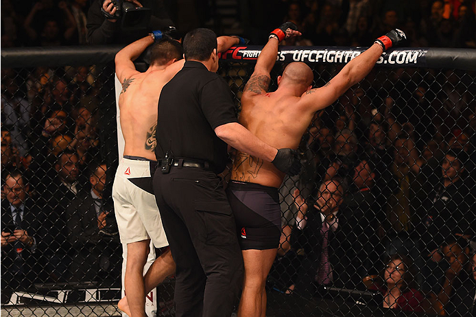 LAS VEGAS, NV - JANUARY 02: Carlos Condit (left) and Robbie Lawler (right) reset after their UFC welterweight championship bout during the UFC 195 event inside MGM Grand Garden Arena on January 2, 2016 in Las Vegas, Nevada. (Photo by Josh Hedges/Zuffa LL