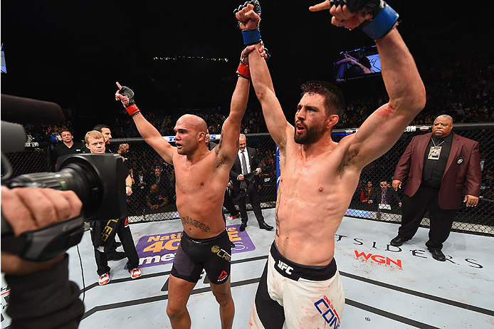 LAS VEGAS, NV - JANUARY 02: Robbie Lawler (left) celebrates with Carlos Condit (right) after their UFC welterweight championship bout during the UFC 195 event inside MGM Grand Garden Arena on January 2, 2016 in Las Vegas, Nevada. (Photo by Josh Hedges/Zu