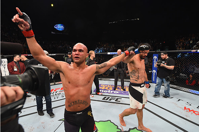 LAS VEGAS, NV - JANUARY 02: Robbie Lawler celebrates with Carlos Condit after their UFC welterweight championship bout during the UFC 195 event inside MGM Grand Garden Arena on January 2, 2016 in Las Vegas, Nevada. (Photo by Josh Hedges/Zuffa LLC/Zuffa L