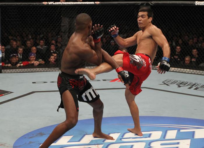 TORONTO, ON - DECEMBER 10: (R-L) Lyoto Machida kicks Jon "Bones" Jones during the UFC 140 event at Air Canada Centre on December 10, 2011 in Toronto, Ontario, Canada. (Photo by Nick Laham/Zuffa LLC/Zuffa LLC via Getty Images)