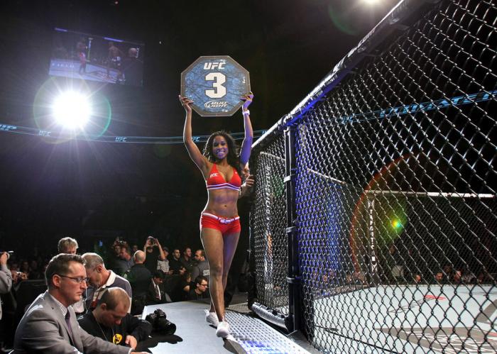 TORONTO, ON - DECEMBER 10: UFC Octagon Girl Chandella Powell introduces round three during the Watson v Jabouin bout during the UFC 140 event at Air Canada Centre on December 10, 2011 in Toronto, Canada. (Photo by Josh Hedges/Zuffa LLC/Zuffa LLC via Get