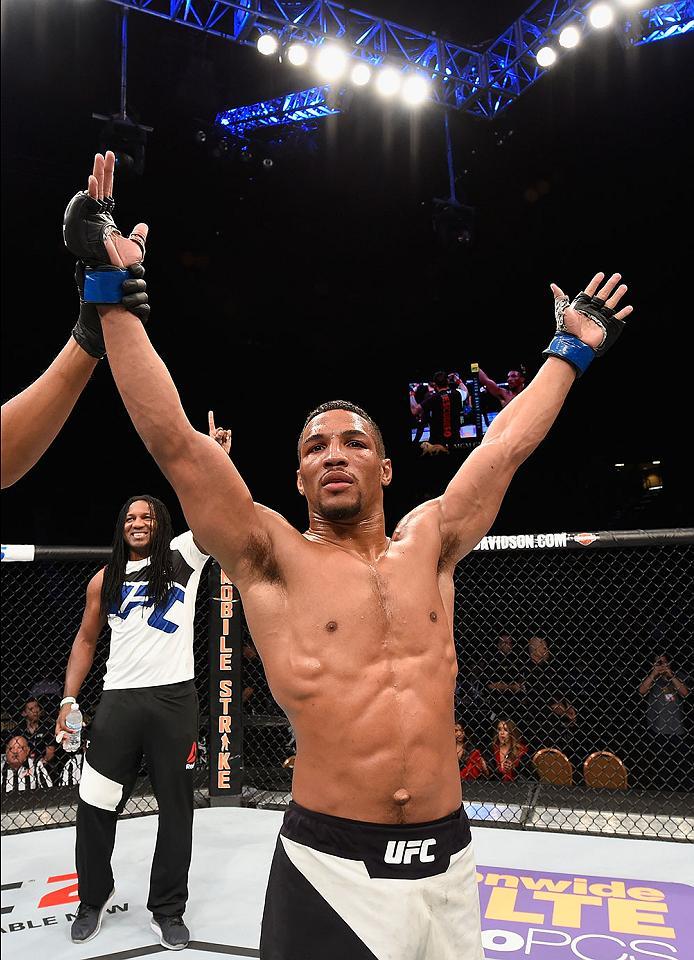LAS VEGAS, NV - APRIL 23: Kevin Lee celebrates his victory over Efrain Escudero of Mexico after their lightweight bout during the UFC 197 event inside MGM Grand Garden Arena on April 23, 2016 in Las Vegas, Nevada. (Photo by Josh Hedges/Zuffa LLC/Zuffa L