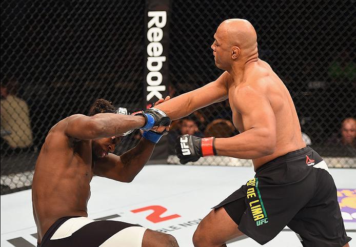 LAS VEGAS, NV - APRIL 23: (R-L) Marcos Rogerio de Lima of Brazil punches Clint Hester in their light heavyweight bout during the UFC 197 event inside MGM Grand Garden Arena on April 23, 2016 in Las Vegas, Nevada. (Photo by Josh Hedges/Zuffa LLC/Zuffa LL