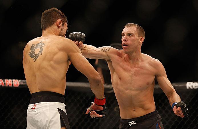 LAS VEGAS, NV - APRIL 23: (R-L) James Vick punches Glaico Franca in their lightweight bout during the UFC 197 event inside MGM Grand Garden Arena on April 23, 2016 in Las Vegas, Nevada. (Photo by Christian Petersen/Zuffa LLC/Zuffa LLC via Getty Images)