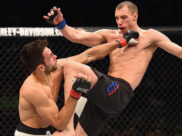 LAS VEGAS, NV - APRIL 23: (R-L) James Vick knees Glaico Franca of Brazil in their lightweight bout during the UFC 197 event inside MGM Grand Garden Arena on April 23, 2016 in Las Vegas, Nevada. (Photo by Josh Hedges/Zuffa LLC/Zuffa LLC via Getty Images)
