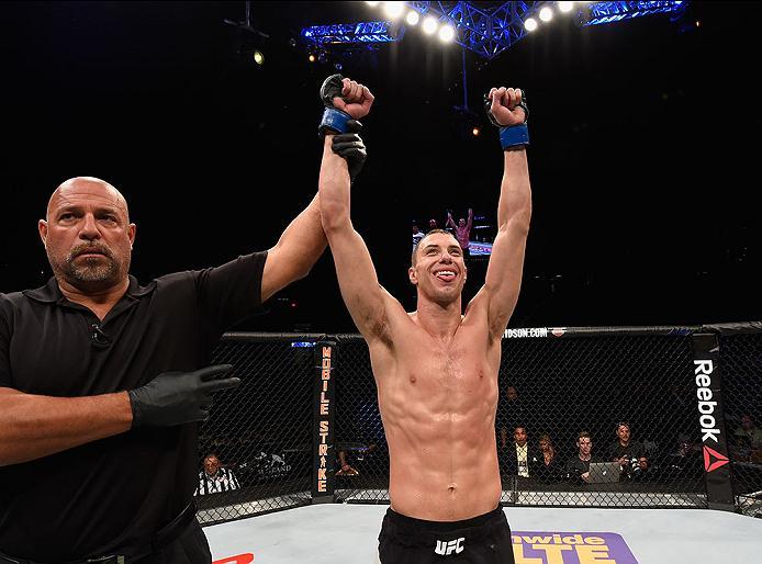 LAS VEGAS, NV - APRIL 23: James Vick celebrates his decision victory over Glaico Franca of Brazil in their lightweight bout during the UFC 197 event inside MGM Grand Garden Arena on April 23, 2016 in Las Vegas, Nevada. (Photo by Josh Hedges/Zuffa LLC/Zu