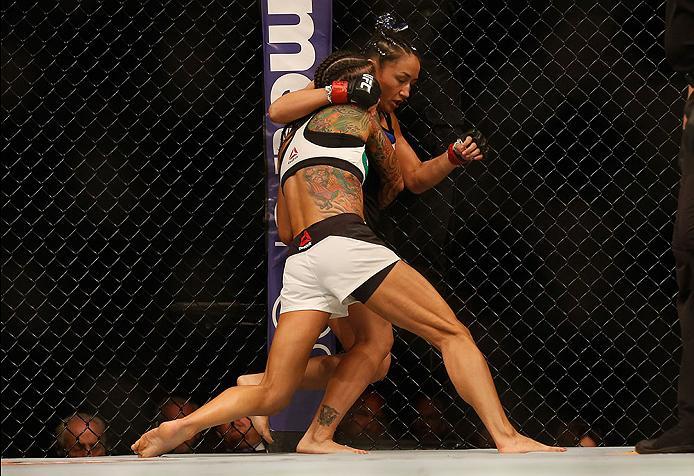 LAS VEGAS, NV - APRIL 23: (L-R) Juliana Lima attempts to take down Carla Esparza in their women's strawweight bout during the UFC 197 event inside MGM Grand Garden Arena on April 23, 2016 in Las Vegas, Nevada. (Photo by Christian Petersen/Zuffa LLC/Zuff