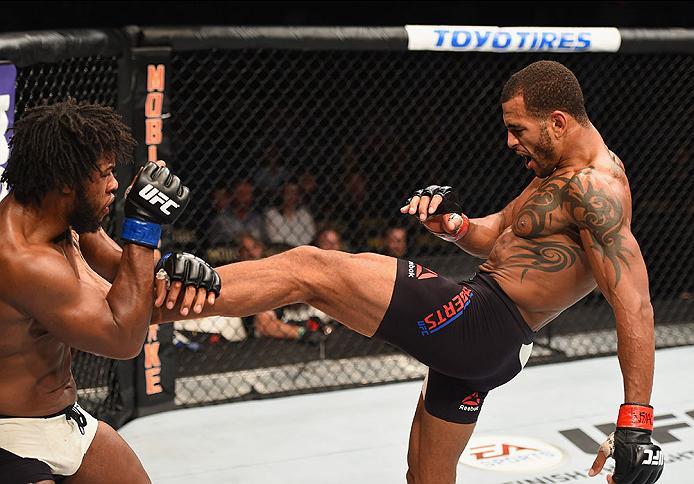 LAS VEGAS, NV - APRIL 23: (R-L) Danny Roberts of England kicks Dominique Steele in their welterweight bout during the UFC 197 event inside MGM Grand Garden Arena on April 23, 2016 in Las Vegas, Nevada. (Photo by Josh Hedges/Zuffa LLC/Zuffa LLC via Getty