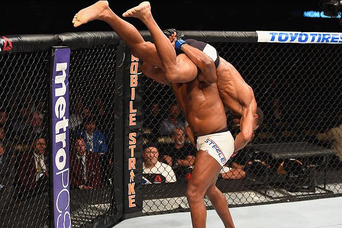 LAS VEGAS, NV - APRIL 23: (L-R) Dominique Steele picks up Danny Roberts of England in their welterweight bout during the UFC 197 event inside MGM Grand Garden Arena on April 23, 2016 in Las Vegas, Nevada. (Photo by Josh Hedges/Zuffa LLC/Zuffa LLC via Ge